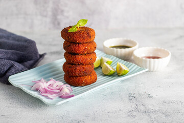 "Dahi ke kebab", a creamy, spiced yogurt patties mixed with herbs and breadcrumbs, shallow-fried to golden perfection, soft inside, crisp outside.
