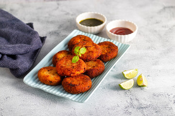 "Dahi ke kebab", a creamy, spiced yogurt patties mixed with herbs and breadcrumbs, shallow-fried to golden perfection, soft inside, crisp outside.
