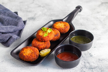 "Dahi ke kebab", a creamy, spiced yogurt patties mixed with herbs and breadcrumbs, shallow-fried to golden perfection, soft inside, crisp outside.
