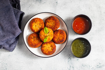 "Dahi ke kebab", a creamy, spiced yogurt patties mixed with herbs and breadcrumbs, shallow-fried to golden perfection, soft inside, crisp outside.
