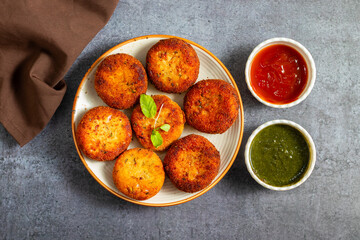 "Dahi ke kebab", a creamy, spiced yogurt patties mixed with herbs and breadcrumbs, shallow-fried to golden perfection, soft inside, crisp outside.
