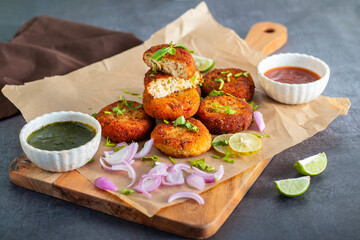 "Dahi ke kebab", a creamy, spiced yogurt patties mixed with herbs and breadcrumbs, shallow-fried to golden perfection, soft inside, crisp outside.
