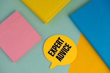 Expert advice message written on yellow dialogue box with blue and yellow background. Conceptual expert advice symbol. Copy space.