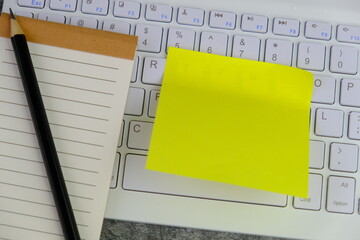 blank paper next to school tools with no word as a template for text space concept. business and education concept