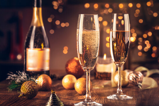 champagne glasses and christmas decorations
