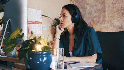 Remote work, headphones or woman with computer in home office, planning or thinking for creative...