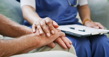 Clipboard, healthcare and nurse holding hands with old person in clinic for consulting or support....