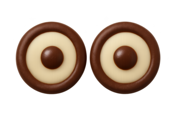 Two round chocolate cookies with white center ring and dark brown dot, resembling eyes