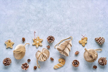 Christmas  paper decoration with gingerbread and pine cones , minimalist and plastic free. Flat lay, top view