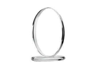 Sleek, oval-shaped metallic object on a reflective base, isolated on black background