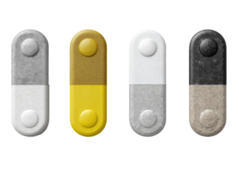 Four oblong objects, vertically split into colors, textured and buttoned on ends, set against black