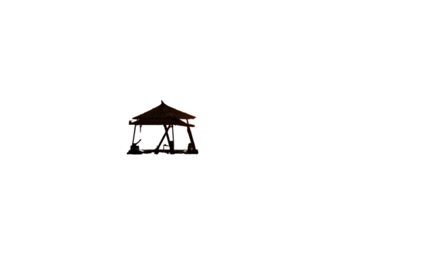 Lit gazebo glowing softly against near-total darkness