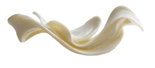 Creamy, flowing substance in motion against a black background