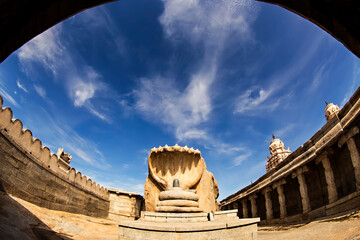 Lepakshi Nagalinga, a massive Nagalinga, a monolithic sculpture carved from a single granite boulder, featuring a seven-headed serpent (Sheshanaga) that provides an umbrella-like shelter over the ling