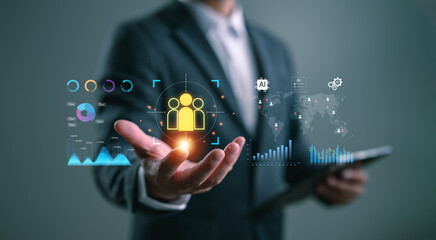 Businessman using AI and data analytics for CRM and customer segmentation. Concept of smart...