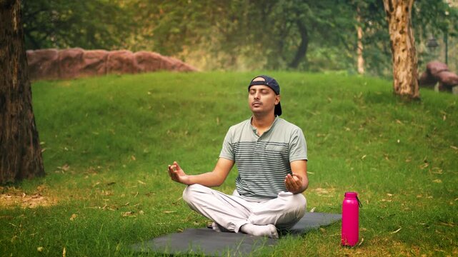 Equal breathing, known as Sama Vritti in Sanskrit. A man practicing this breathing technique focuses on making his inhales and exhales equal in length in Delhi, India.