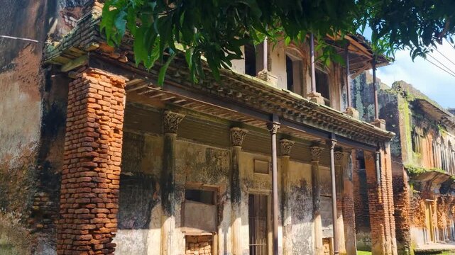 Sunlit brick walls and weathered arches reveal a colonial mansion in Panam Nagar, Bangladesh, offering a striking view of its fading grandeur and echoes of a bygone era