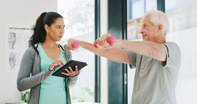 Senior man, dumbbell or personal trainer with tablet, assessment or muscle training for health. Retirement fitness, people or instructor with tech for strength test, record progress and weightlifting
