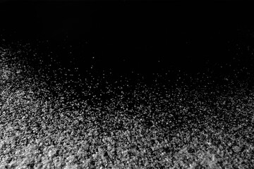  white snow on the black background