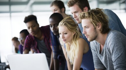 Collaborative team meeting in modern office space group analyzing data on laptop professional environment close-up view
