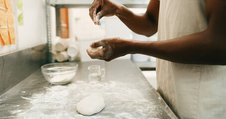 Chef, hands and flour in bakery with dough for baking bread, cooking food and restaurant cuisine....