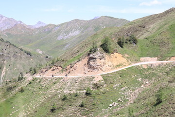 Motorcyclists Riding a Scenic Mountain Pass Road