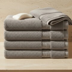 A stack of towels sitting on top of a table