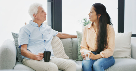 Smile, coffee and daughter with old man on sofa for support, reunion and bonding. Retirement home,...