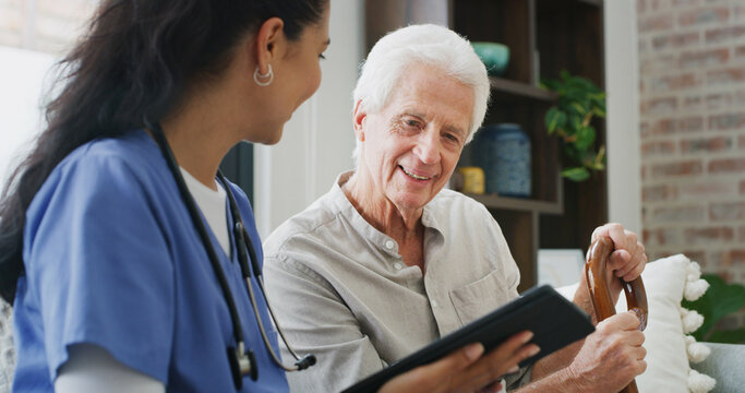 Old man, caregiver or discussion with tablet in nursing home for wellness, medical feedback or chat. Conversation, elderly person and nurse with tech for health update, online test results or advice. - Powered by Adobe