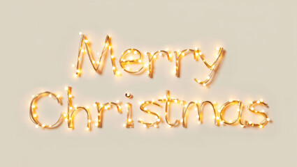 Warm glowing fairy lights form the words “Merry Christmas” on a soft beige background, creating a festive and elegant holiday mood