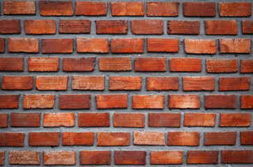 Old Red Brick Wall Texture. Weathered Brick Background with Gray Mortar