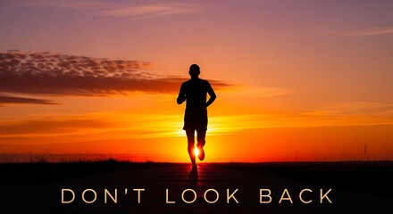 A lone runner jogs towards a vibrant sunset on an open road
