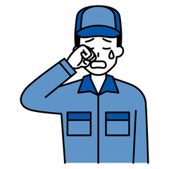 泣くつなぎ作業服の男性