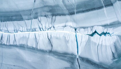 Intense Blue Glacial Ice Texture Background with Dramatic Cracks and Fissures