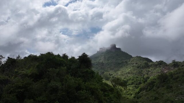 Citadelle Laferri&egrave;re in clouds seen from valley, Haiti. Aerial drone view