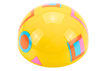Yellow toy ball with colorful abstract geometric shapes on it isolated on transparent background