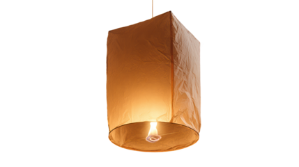 Cutout of a floating lantern glowing softly in darkness