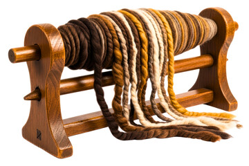 Skein of earth-toned wool yarn on a wooden yarn swift winder isolated on transparent background