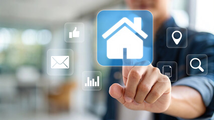Hand touching digital house icon on virtual interface, representing smart real estate technology, home search, online property services, housing market innovation, and modern business solutions.