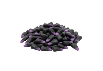 A heap of purple and black Halloween candy corn set against a white backdrop