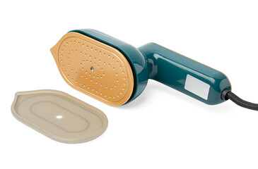 Mini steam iron for ironing clothes. Travel steam iron, for traveling. Device. Household technologies.