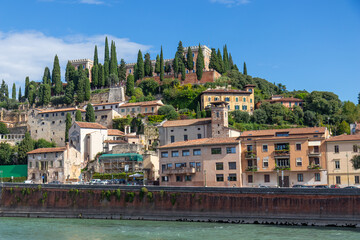 Obraz premium Photo of San Pietro, an ancient castle on a hill in Verona, Italy, with a viewing platform overlooking the Adige River, offering panoramic views of the city, medieval architecture of Veneto region