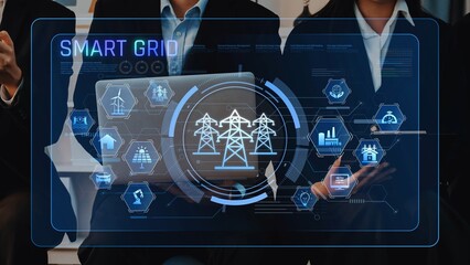 Business professionals engage in discussion about smart grid technology, featuring a digital interface that highlights key aspects of energy management and analytics. Raster