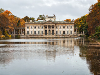The Palace on the Water Reflected in Autumnal Łazienki Park.
Palace on the Water (Pałac na Wyspie), a beautiful neoclassical building located in Łazienki Park (Royal Baths Park) in Warsaw, Poland.