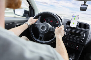 Naklejka premium a man is driving a car