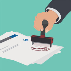 Hand stamping the word approved on a document