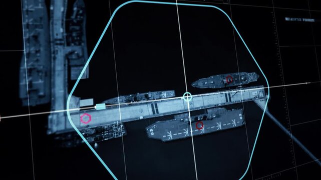 Spying system is gathering intelligence using a satellite camera. Spy satellite camera is collecting intelligence about enemy positions. Spy satellite processing intelligence about aircraft carriers.