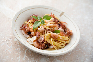 Spaghetti with seafood and basil