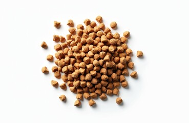 Dry dog food kibble pile on white background. Brown pet food pellets scattered in heap. Top view of dog feed. Isolated dog nutrition. Brown kibble for adult dog.