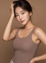 Elegant Korean woman with low bun hairstyle, Asian beauty model in autumn mood, natural and graceful cosmetic model, pure and serene female portrait, ,k-beauty model, kbeauty